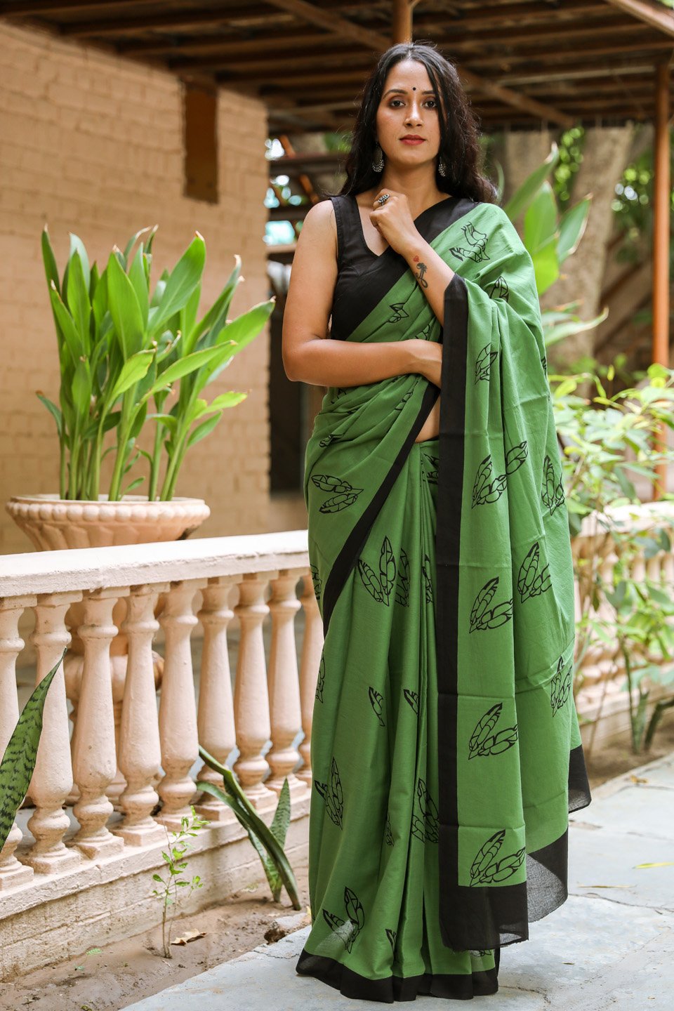 Daark green buti mulmul saree
