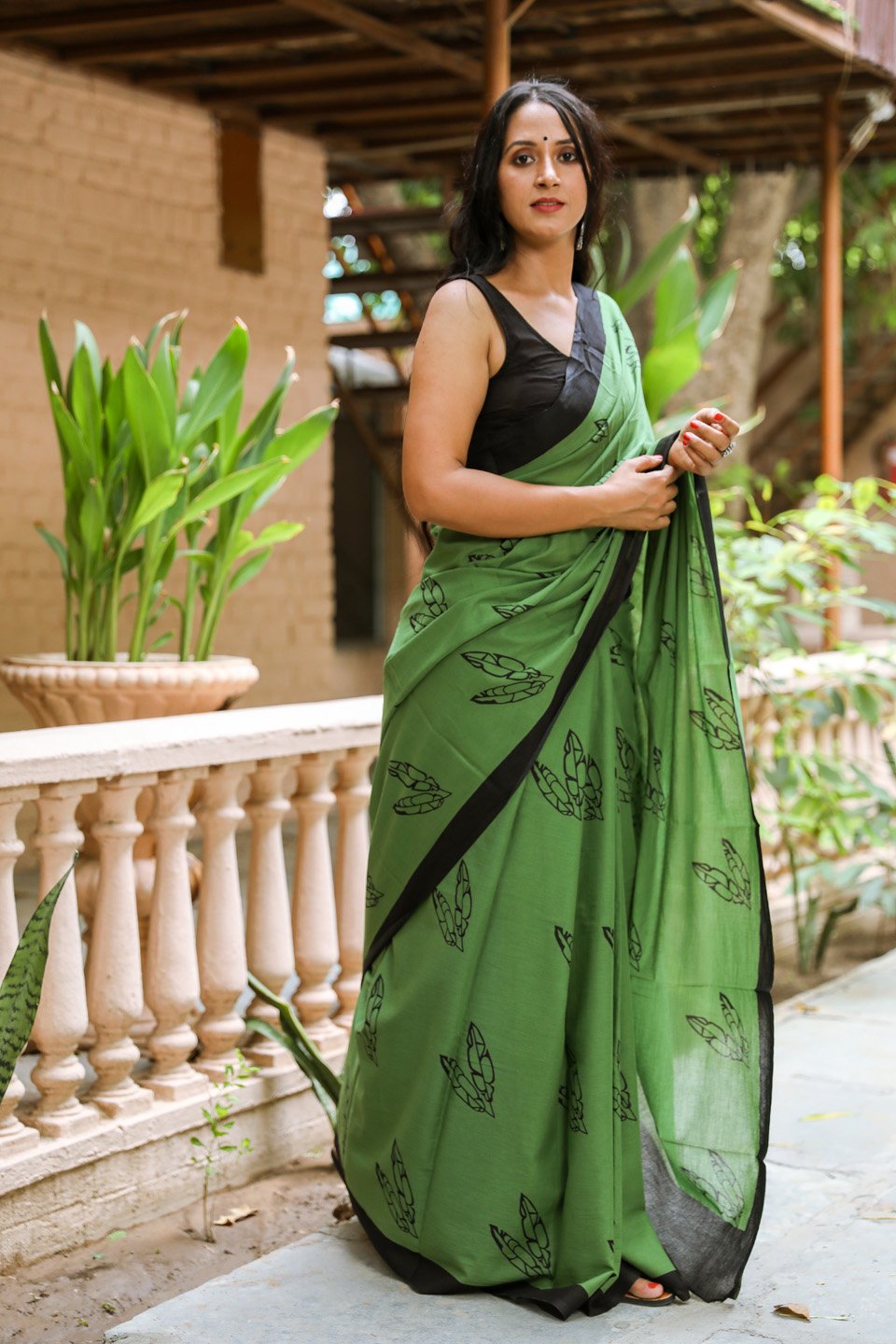 Daark green buti mulmul saree